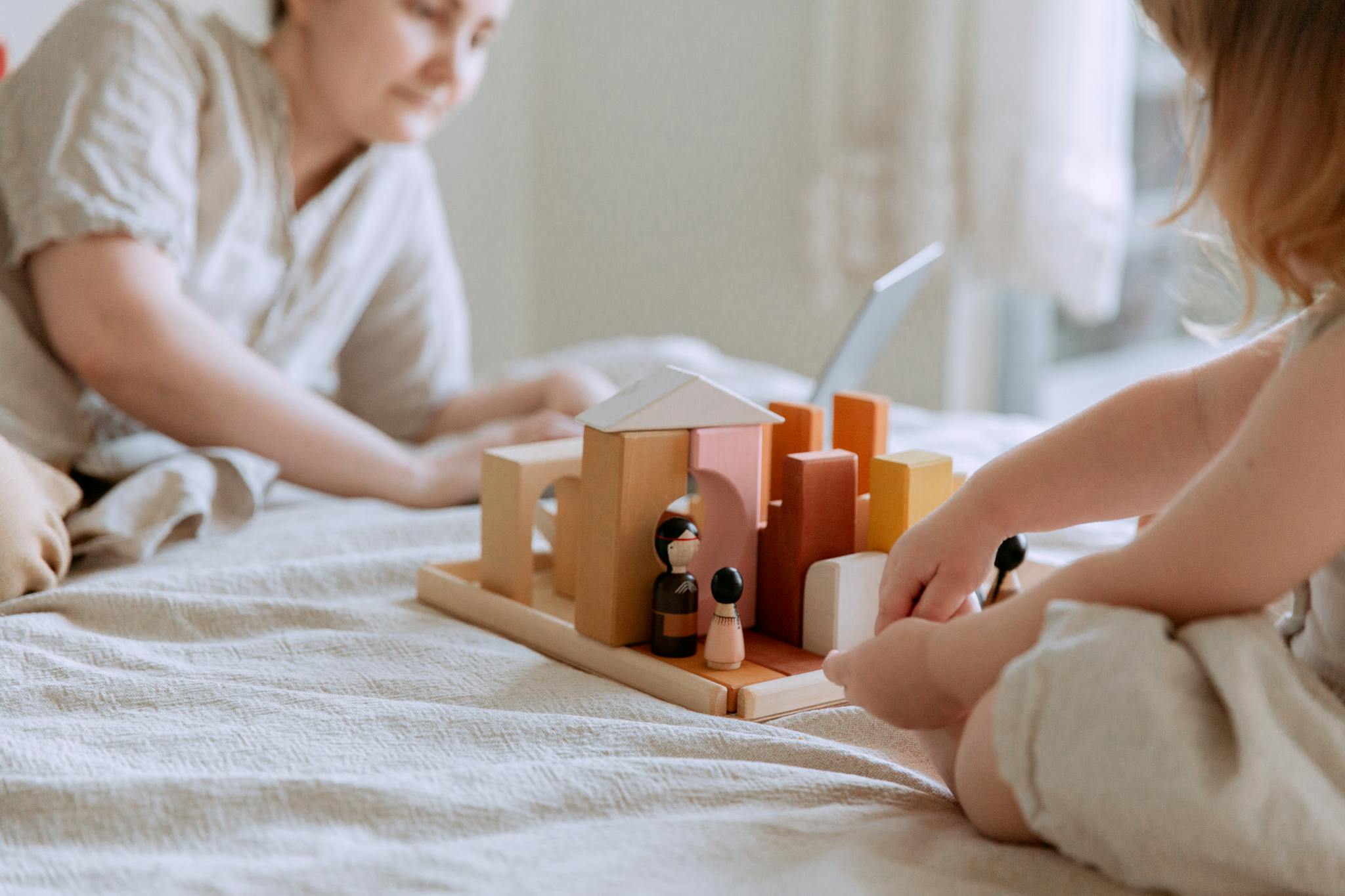 a mother and child engaged in creative