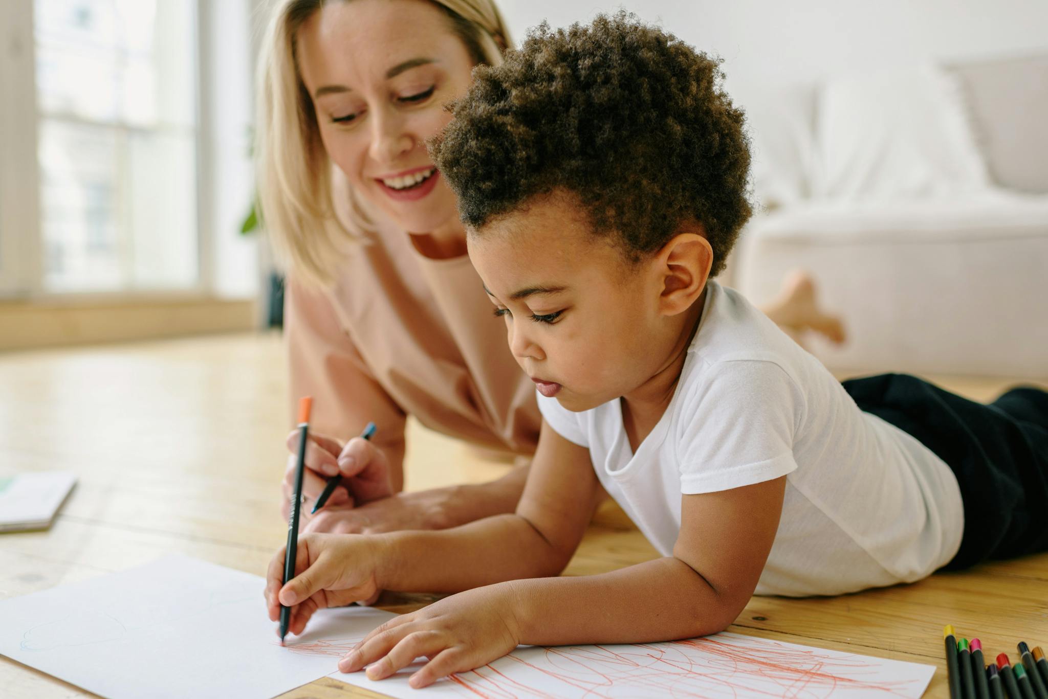 mother and son bonding through drawing at